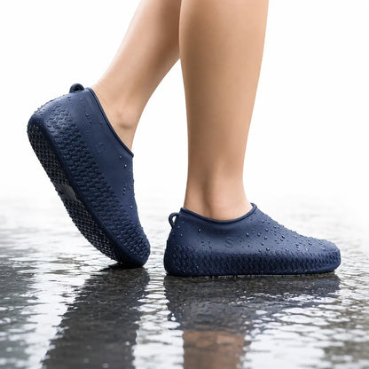 Person Wearing Non-Slip Silicone Waterproof Shoe Covers While Walking on Wet Surface