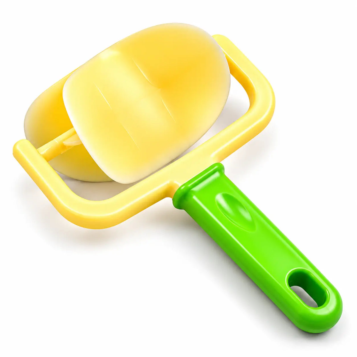 Plastic round dough cutter with yellow roller and green handle on a white background