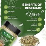 Dried rosemary leaves sprinkled as a food-grade seasoning on a pasta dish, highlighting its culinary benefits.